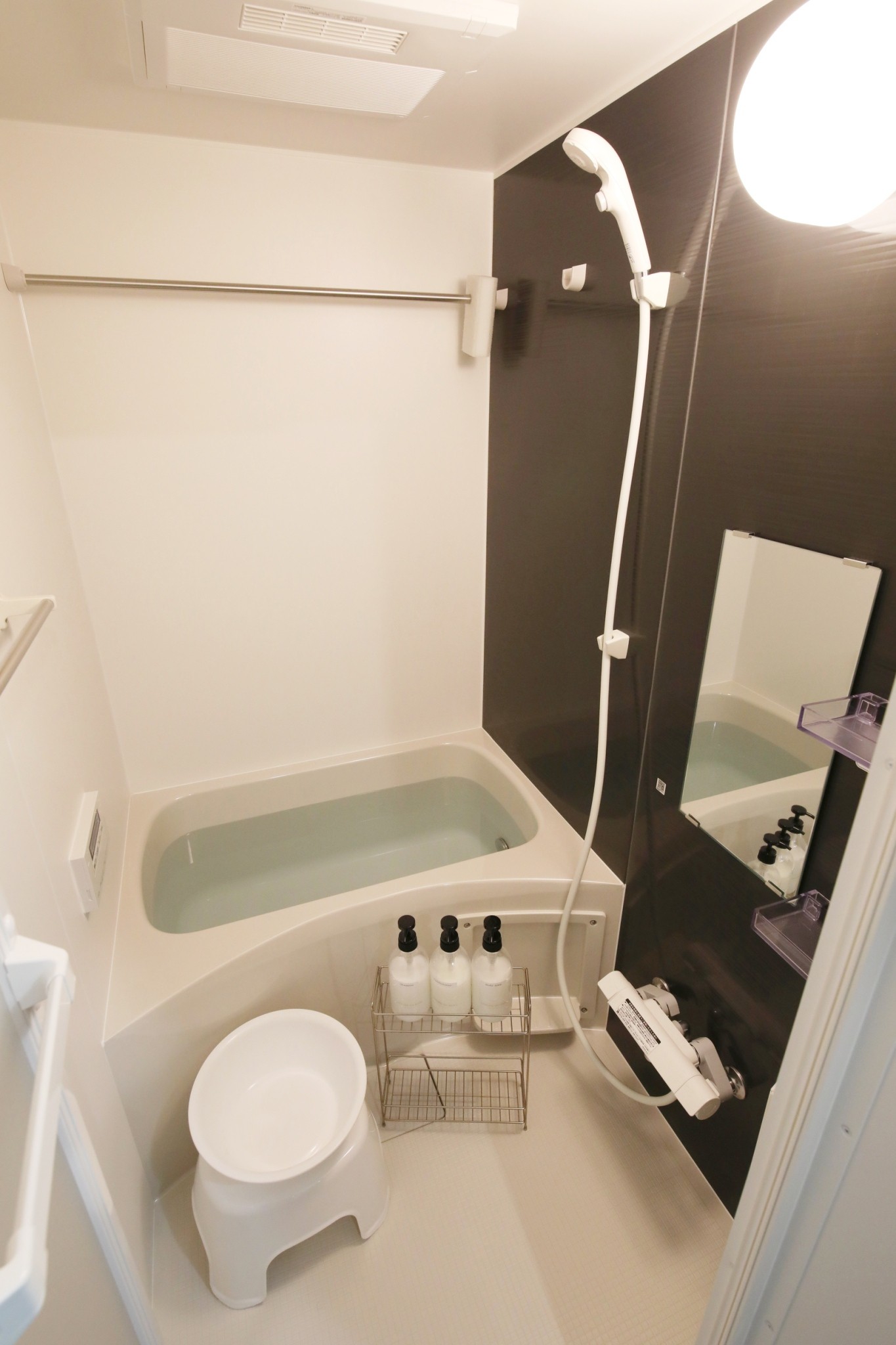 Room 401 bathroom with bathtub and shower