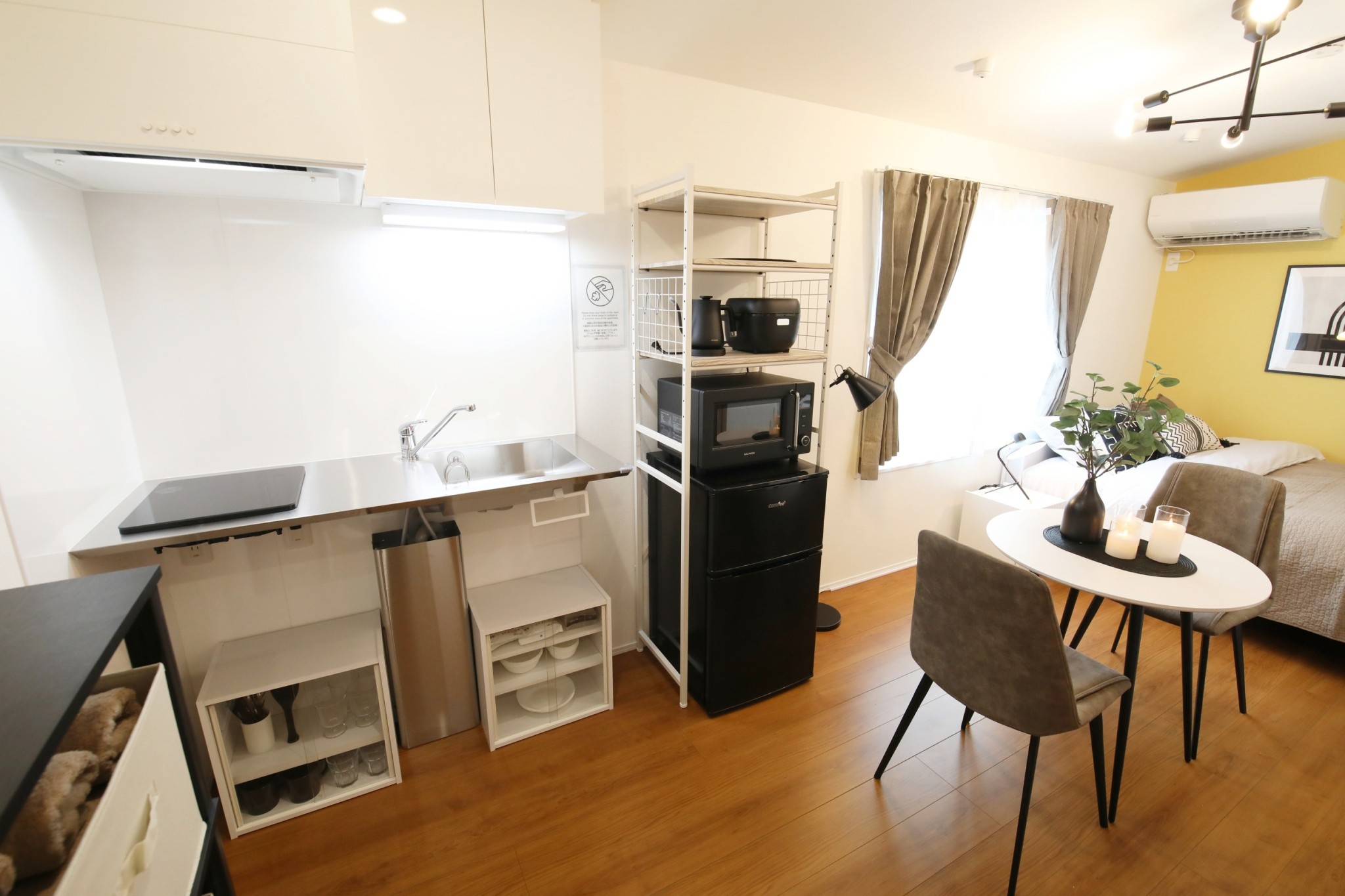 Room 401 full kitchen with cabinets, sink and appliances