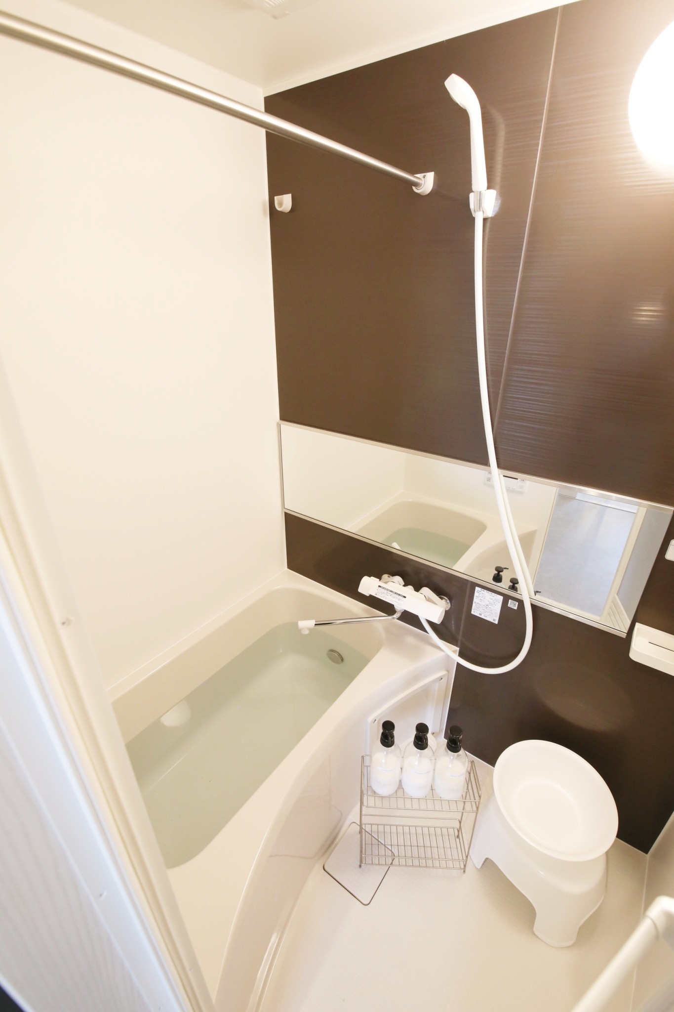 Room 103 bathroom with bathtub and shower